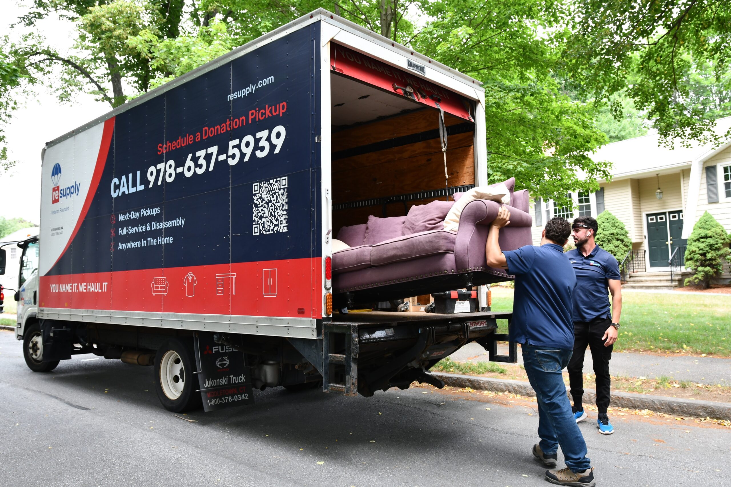 Couch ready for donation pickup at a donor home